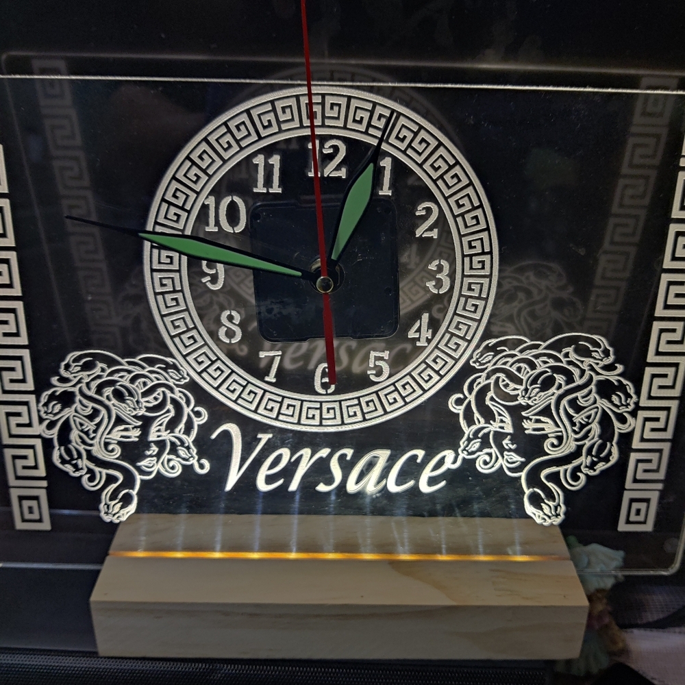 Greek logo clock with led lights